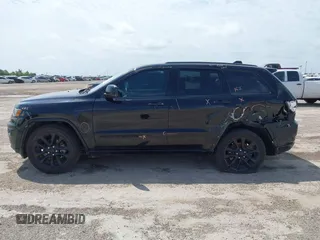 2019 Jeep Grand Cherokee Altitude with VIN 1C4RJEAG0KC857787, listed as a IAAI auction lot 42434646 with 193,968 mi miles and . Bid and sale history available at DreamBid. Image 14.