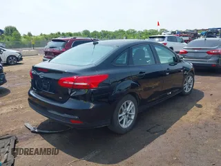 2017 Ford Focus SE with VIN 1FADP3F25HL292056, listed as a IAAI auction lot 42409320 with 102,956 mi miles and . Bid and sale history available at DreamBid. Image 4.