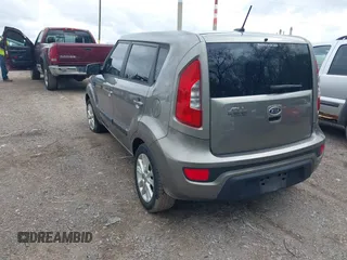 2012 Kia Soul + with VIN KNDJT2A65C7403493, listed as a IAAI auction lot 42095119 with 151,258 mi miles. Bid and sale history available at carsss.com. Image 3.