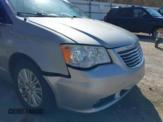2013 Chrysler Town & Country Touring L with VIN 2C4RC1CG6DR660858, listed as a IAAI auction lot 41970976 with 140,299 mi miles and . Bid and sale history available at DreamBid. Image 18.