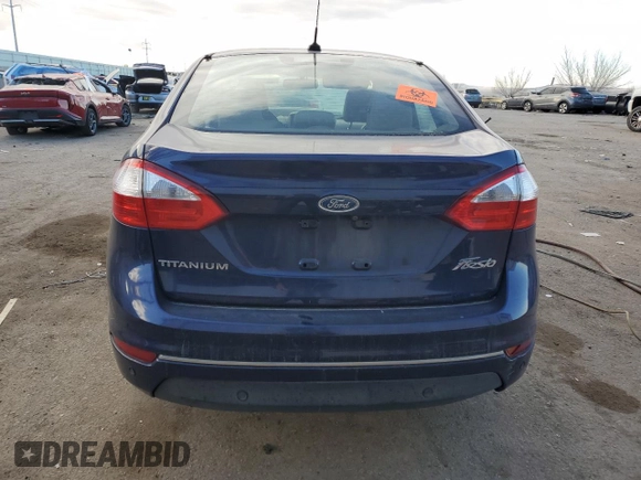 2016 Ford Fiesta Titanium z VIN 3FADP4CJ5GM175110, wystawiony jako Copart lot #89137195 z przebiegiem 129 193 mil mil oraz Szkoda całkowita • Salvage title. Historia ofert i sprzedaży dostępna na DreamBid. Obrazek 6.