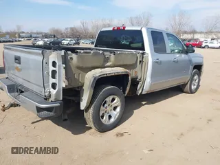 2016 Chevrolet Silverado 1500 LT with VIN 1GCVKREC4GZ125676, listed as a IAAI auction lot 42006237 with 114,699 mi miles. Bid and sale history available at carsss.com. Image 4.