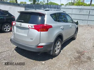 2013 Toyota RAV4 XLE with VIN JTMRFREV6DD011338, listed as a IAAI auction lot 42214088 with 202,537 mi miles and . Bid and sale history available at DreamBid. Image 4.