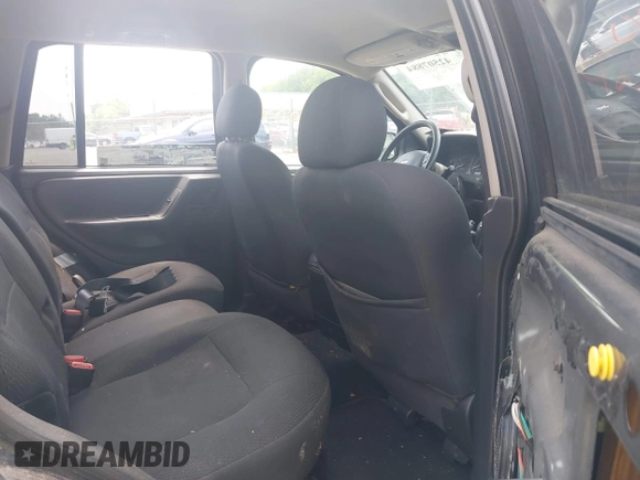 2003 Jeep Grand Cherokee Laredo with VIN 1J4GW48S03C557756, listed as a IAAI auction lot 42507884 with 195,236 mi miles and . Bid and sale history available at DreamBid. Image 8.