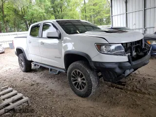 2019 Chevrolet Colorado 4WD ZR2 with VIN 1GCGTEEN5K1256848, listed as a Copart auction lot 51668185 with 99,913 mi miles and Non Repairable. Bid and sale history available at carsss.com. Image 4.