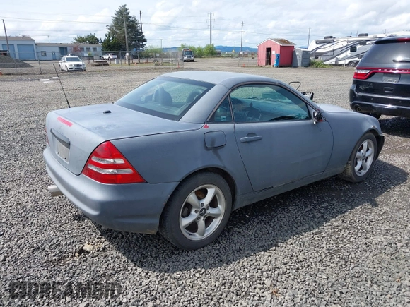 2003 Mercedes-Benz SLK 320 with VIN WDBKK65F63F282132, listed as a IAAI auction lot 41965580 with 166,115 mi miles and . Bid and sale history available at DreamBid. Image 4.