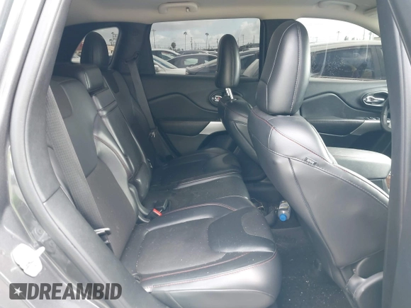 2018 Jeep Cherokee Trailhawk with VIN 1C4PJMBX0JD534722, listed as a IAAI auction lot 41557426 with 109,429 mi miles and . Bid and sale history available at DreamBid. Image 8.