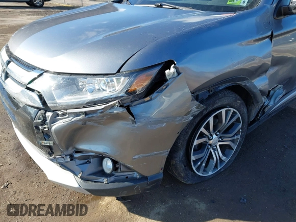 2016 Mitsubishi Outlander SE with VIN JA4AZ3A30GZ039451, listed as a IAAI auction lot 41839444 with 151,357 mi miles and . Bid and sale history available at DreamBid. Image 17.