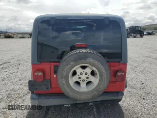 2003 Jeep Wrangler Sport with VIN 1J4FA49S83P369892, listed as a Copart auction lot 56536745 with 182,535 mi miles and Salvage title. Bid and sale history available at DreamBid. Image 6.