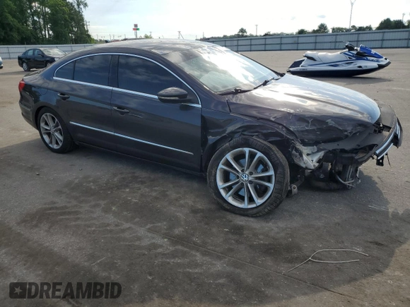 2010 Volkswagen CC Luxury with VIN WVWHL7AN3AE520131, listed as a Copart auction lot 55676515 with 111,128 mi miles and Salvage title. Bid and sale history available at DreamBid. Image 4.