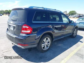 2012 Mercedes-Benz GL 350 with VIN 4JGBF2FEXCA776247, listed as a IAAI auction lot 41837519 with 119,421 mi miles and . Bid and sale history available at DreamBid. Image 4.