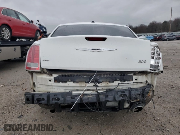 2013 Chrysler 300 S z VIN 2C3CCAGG1DH590552, wystawiony jako Copart lot #83837574 z przebiegiem 213 704 mil mil oraz Nie do naprawy • Non repairable. Historia ofert i sprzedaży dostępna na DreamBid. Obrazek 6.