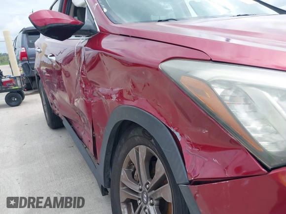 2016 Hyundai Santa Fe z VIN 5XYZT3LB1GG321854, wystawiony jako IAAI lot #40244942 z przebiegiem Nie podano mil oraz . Historia ofert i sprzedaży dostępna na DreamBid. Obrazek 15.