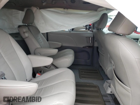 2011 Toyota Sienna XLE AAS with VIN 5TDYK3DCXBS063948, listed as a Copart auction lot 59776695 with 305,799 mi miles and Salvage title. Bid and sale history available at DreamBid. Image 11.