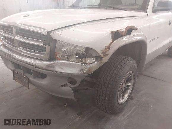 1999 Dodge Dakota SLT with VIN 1B7GG22XXXS254782, listed as a IAAI auction lot 41847644 with 164,607 mi miles and . Bid and sale history available at carsss.com. Image 6.