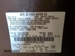 2015 Ford Taurus SEL with VIN 1FAHP2E94FG157022, listed as a Copart auction lot 74569614 with 133,223 mi miles and Salvage Title. Bid and sale history available at DreamBid. Image 12.