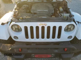 2015 Jeep Wrangler Unlimited Rubicon with VIN 1C4BJWFG5FL659017, listed as a Copart auction lot 84435034 with 69,915 mi miles and Salvage Title. Bid and sale history available at carsss.com. Image 11.