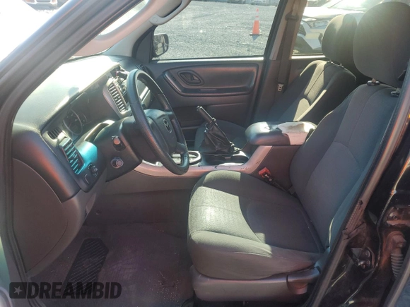 2005 Mazda Tribute i with VIN 4F2YZ02Z05KM38128, listed as a Copart auction lot 83175604 with 320,405 mi miles and Salvage Title. Bid and sale history available at carsss.com. Image 7.