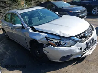 2017 Nissan Altima S with VIN 1N4AL3AP7HN326973, listed as a IAAI auction lot 41873195 with 200,187 mi miles and . Bid and sale history available at DreamBid. Image 1.