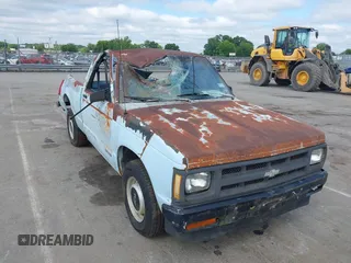 1991 Chevrolet Colorado 1LT z VIN 1GCCS14E7M8105645, wystawiony jako IAAI lot #42379685 z przebiegiem 106 778 mil mil oraz . Historia ofert i sprzedaży dostępna na DreamBid. Obrazek 1.