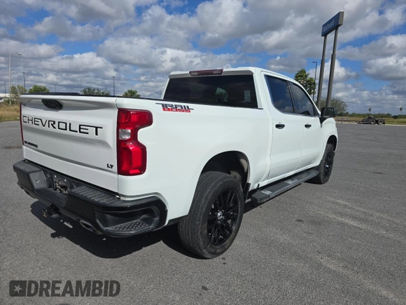 2022 Chevrolet Silverado 1500 LT Trail Boss with VIN 3GCUDFELXNG514100, listed as a Copart auction lot 86590144 with 44,909 mi miles and Salvage Title. Bid and sale history available at DreamBid. Image 4.