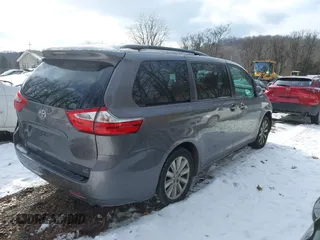2017 Toyota Sienna LE with VIN 5TDJZ3DC5HS173134, listed as a IAAI auction lot 41256534 with 70,940 mi miles. Bid and sale history available at carsss.com. Image 4.