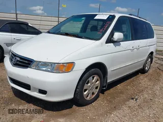 2003 Honda Odyssey EX-L with VIN 5FNRL18983B122294, listed as a IAAI auction lot 41922671 with 215,911 mi miles and . Bid and sale history available at DreamBid. Image 2.