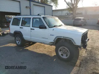 1997 Jeep Cherokee Sport with VIN 1J4FT68S9VL547391, listed as a Copart auction lot 70447484 with 250,171 mi miles and Salvage Title. Bid and sale history available at carsss.com. Image 4.