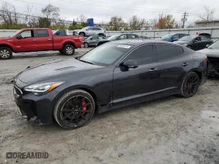 2023 Kia Stinger GT2 with VIN KNAE55LC9P6127666, listed as a Copart auction lot 80554914 with 26,500 mi miles and Salvage Title. Bid and sale history available at carsss.com. Image 1.