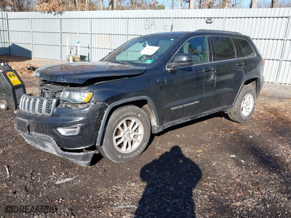 2018 Jeep Grand Cherokee Laredo E with VIN 1C4RJFAG4JC326631, listed as a IAAI auction lot 41191061 with 115,451 mi miles. Bid and sale history available at carsss.com. Image 2.
