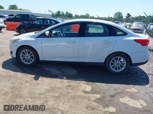 2018 Ford Focus SE with VIN 1FADP3F20JL234829, listed as a IAAI auction lot 42546330 with 101,713 mi miles and . Bid and sale history available at DreamBid. Image 14.