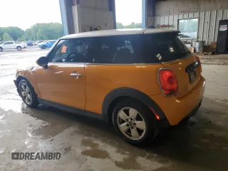 2017 MINI Hardtop Cooper with VIN WMWXP5C37H2D17030, listed as a Copart auction lot 54658275 with 144,308 mi miles and Salvage title. Bid and sale history available at DreamBid. Image 2.