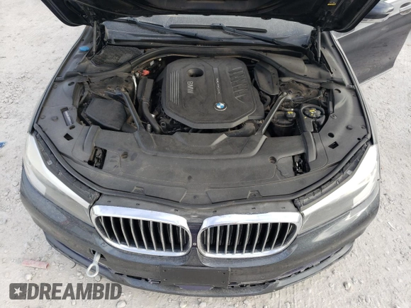 2017 BMW 7 Series 740i xDrive with VIN WBA7E4C5XHGU99064, listed as a Copart auction lot 70792133 with 122,264 mi miles. Bid and sale history available at carsss.com. Image 11.