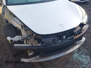 2018 Tesla Model 3 Long Range Battery with VIN 5YJ3E1EA0JF153146, listed as a IAAI auction lot 41621919 with 76,794 mi miles and . Bid and sale history available at DreamBid. Image 6.