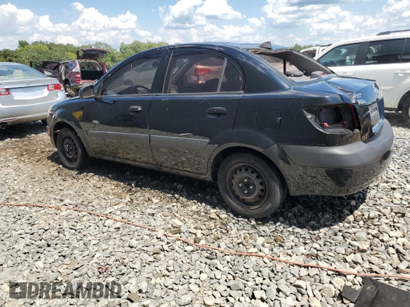 2009 Kia Rio LX with VIN KNADE223296539006, listed as a Copart auction lot 69229394 with 227,766 mi miles and Salvage Title. Bid and sale history available at DreamBid. Image 2.