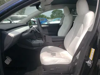 2022 Tesla Model Y Performance z VIN 7SAYGDEF7NF523532, wystawiony jako Copart lot #59949915 z przebiegiem 50 428 mil mil oraz Szkoda całkowita • Salvage title. Historia ofert i sprzedaży dostępna na DreamBid. Obrazek 7.