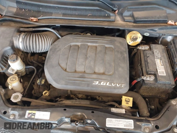 2016 Dodge Grand Caravan SE with VIN 2C4RDGBG1GR117200, listed as a IAAI auction lot 42104773 with 121,007 mi miles and . Bid and sale history available at DreamBid. Image 10.
