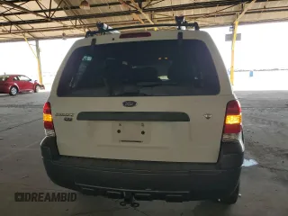 2006 Ford Escape XLT with VIN 1FMYU03166KA73605, listed as a Copart auction lot 71968524 with 143,742 mi miles and Salvage Title. Bid and sale history available at carsss.com. Image 6.