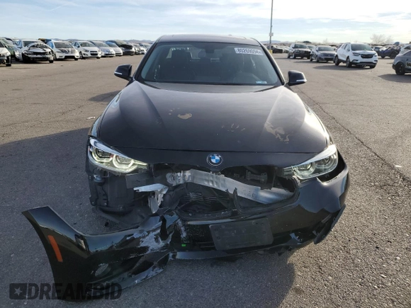 2018 BMW 3 Series 320i with VIN WBA8A9C51JAD27692, listed as a Copart auction lot 80269094 with 67,429 mi miles and Salvage Title. Bid and sale history available at carsss.com. Image 5.