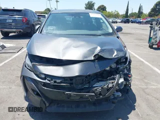 2021 Toyota Prius LE with VIN JTDKAMFPXM3170372, listed as a IAAI auction lot 42661609 with 47,977 mi miles and . Bid and sale history available at DreamBid. Image 12.