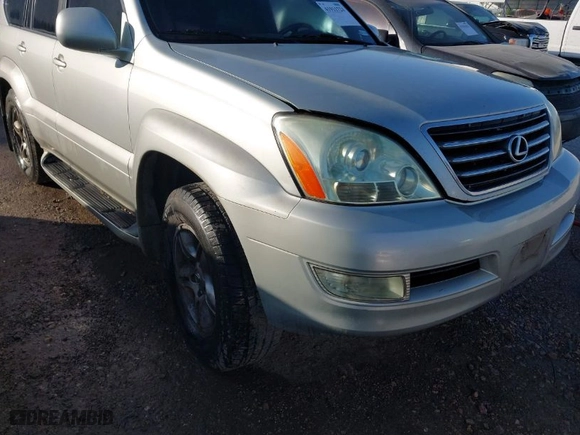 2004 Lexus GX 470 with VIN JTJBT20X840031282, listed as a IAAI auction lot 41911724 with 215,983 mi miles. Bid and sale history available at carsss.com. Image 6.