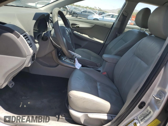2010 Toyota Corolla with VIN 1NXBU4EEXAZ233494, listed as a Copart auction lot 64494725 with 129,452 mi miles and Salvage title. Bid and sale history available at DreamBid. Image 7.