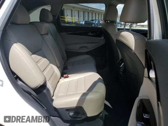 2019 Kia Sorento EX z VIN 5XYPH4A59KG454740, wystawiony jako Copart lot #52552275 z przebiegiem 130 114 mil mil oraz Czysty tytuł • Clean title. Historia ofert i sprzedaży dostępna na DreamBid. Obrazek 11.