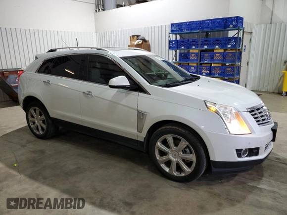 2016 Cadillac SRX Performance Collection with VIN 3GYFNCE36GS525836, listed as a Copart auction lot 84502634 with 94,639 mi miles and Salvage title. Bid and sale history available at DreamBid. Image 4.