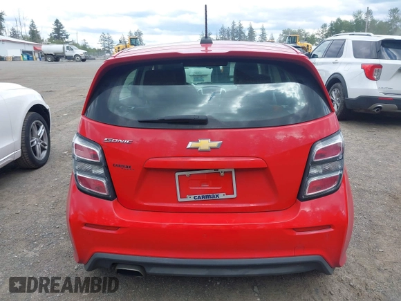 2020 Chevrolet Sonic LT z VIN 1G1JG6SB2L4115688, wystawiony jako IAAI lot #42326438 z przebiegiem 33 871 mil mil oraz . Historia ofert i sprzedaży dostępna na DreamBid. Obrazek 16.