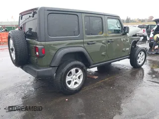 2021 Jeep Wrangler Unlimited Willys with VIN 1C4HJXDN5MW592125, listed as a IAAI auction lot 40821100 with 82,109 mi miles and . Bid and sale history available at DreamBid. Image 4.