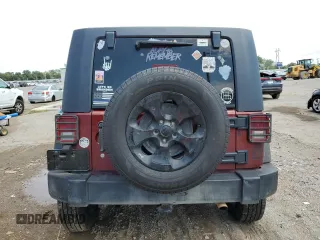 2007 Jeep Wrangler Unlimited Sahara z VIN 1J8GB59107L203053, wystawiony jako Copart lot #66549364 z przebiegiem Nie podano mil oraz Szkoda całkowita • Salvage title. Historia ofert i sprzedaży dostępna na DreamBid. Obrazek 6.