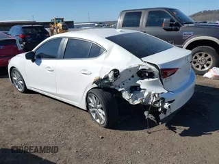 2017 Mazda 3 Grand Touring z VIN 3MZBN1W34HM139393, wystawiony jako IAAI lot #41747788 z przebiegiem 137 275 mil mil oraz . Historia ofert i sprzedaży dostępna na DreamBid. Obrazek 3.