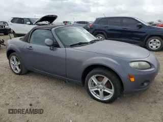 2007 Mazda MX-5 Miata Sport z VIN JM1NC25F970134960, wystawiony jako Copart lot #48422265 z przebiegiem 149 357 mil mil oraz Czysty tytuł • Clean title. Historia ofert i sprzedaży dostępna na DreamBid. Obrazek 4.