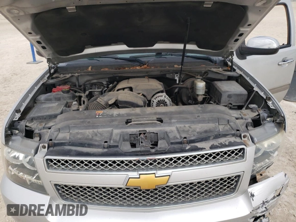 2014 Chevrolet Suburban LT with VIN 1GNSCJE07ER160935, listed as a Copart auction lot 46928335 with 123,811 mi miles and Salvage Title. Bid and sale history available at carsss.com. Image 12.